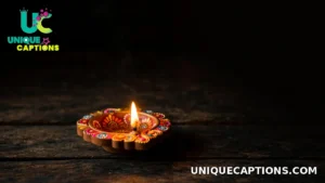 Single hand-painted clay diya on a dark wooden table