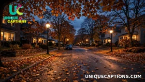 Street lamps glowing among autumn leaves at dusk on the first dark evening of standard time