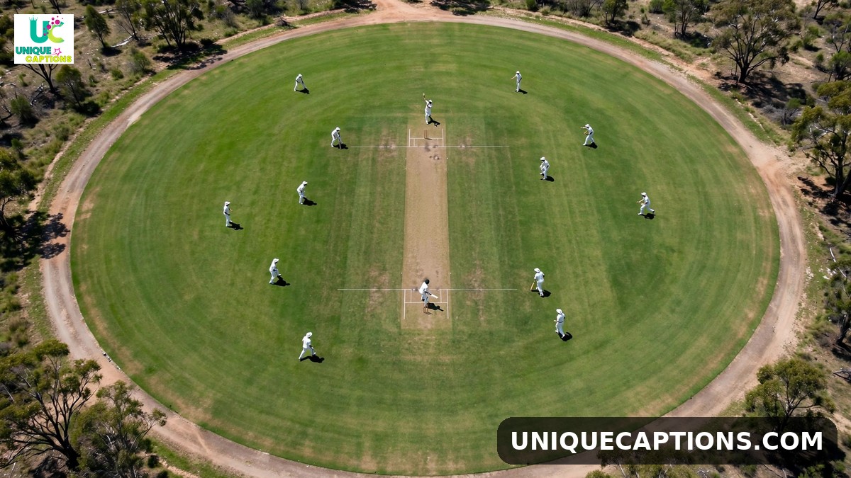 Captain Rohit Sharma captions - aerial view of cricket field with players in white