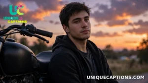 Young man in dark casual clothing leaning against a motorcycle at dusk