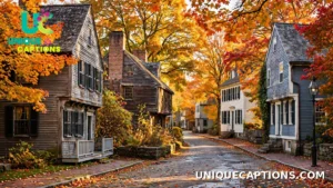 Old New England street with historic houses and autumn leaves